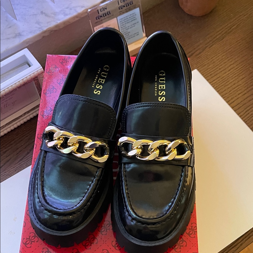 Guess Shiny Black Loafers with Gold Chain Accent
